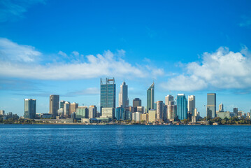 skyline of perth at dusk by swan river in western  australia