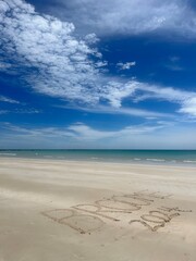 Sand writing at the beach in Broome 