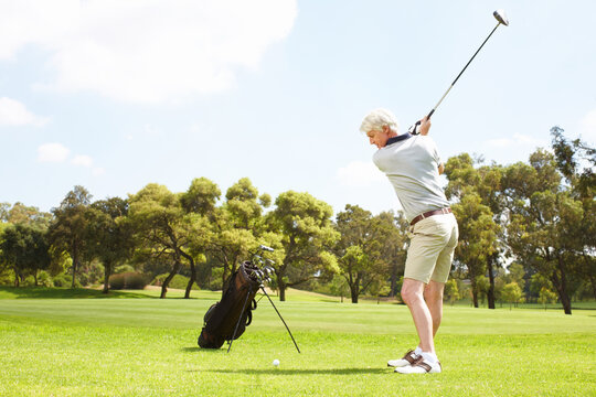 Old man, swing and golf course for sports, club and outdoor fitness for competition or games. Male person, tournament and precision for practice match on turf, exercise and challenge in retirement