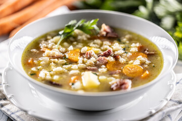 Soup made from barley groats, smoked pork neck, potatoes and root vegetables