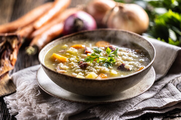 Soup made from barley groats, smoked pork neck, potatoes and root vegetables