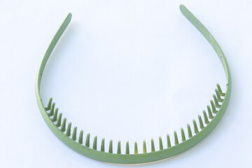 green hairband on white background