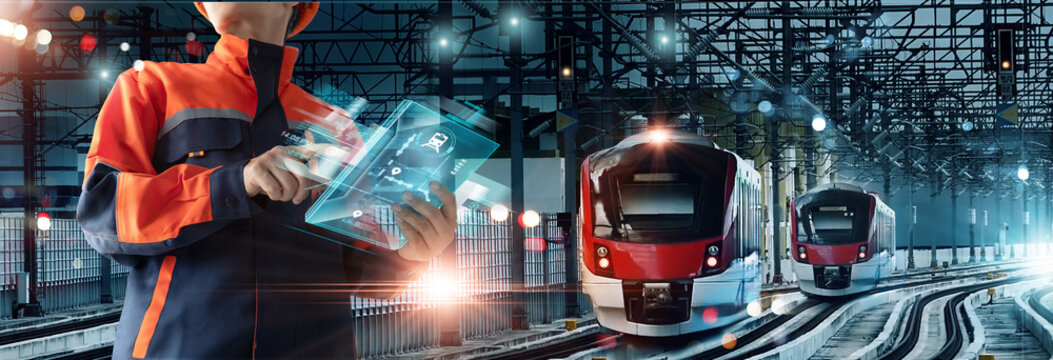 .Transport technology, Engineer using control panel Ui of virtual interface for analysis data systems electrics of track on train railway on networking connection, Modern Industrial and transportation - Powered by Adobe