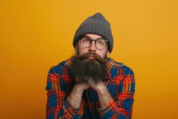hipster man with beard and mustache on yellow background