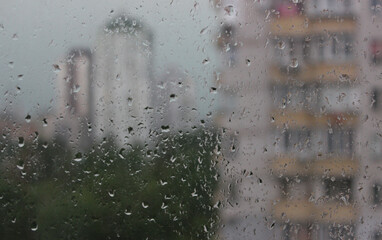 Rain Drops On A Home Window Of Multi Storey Building Stock Photo