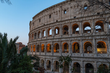 Fototapeta premium Colosseum in the morning light: The ancient amphitheater is beautifully illuminated by the soft morning rays, highlighting its majestic structure and rich history.