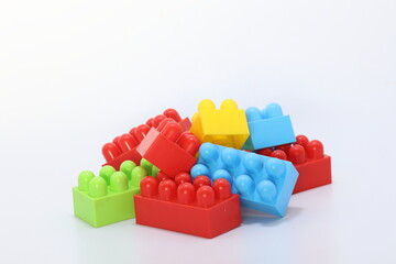 colorful plastic toy blocks on white background