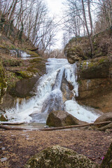 waterfall in winter, frozen streams of water and turned into ice blocks