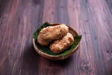 Kue Gemblong, Getas, Kemplang, Indonesian Traditional Snack made from Sticky Rice Coated with Sugar. Perfect for recipe, article, catalogue, commercial, or any cooking content.