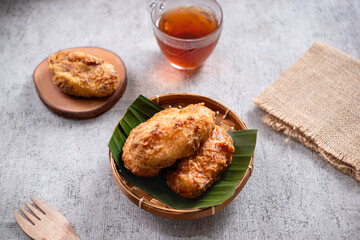 Kue Gemblong, Getas, Kemplang, Indonesian Traditional Snack made from Sticky Rice Coated with Sugar. Perfect for recipe, article, catalogue, commercial, or any cooking content.