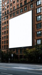 Obraz premium A blank billboard on a brick building, showcasing urban architecture and a city backdrop, perfect for advertising or marketing use.