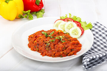 Shaakshuka eggs with tomato and herbs