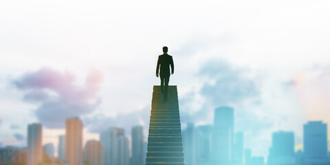 Back view of young businessman climbing ladder on blurry city background with mock up place....