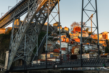 Porto, Portugal. Old town and bridge Ponte Luis I over Douro river at sunset.