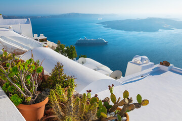 White architecture in Santorini island, Greece. Beautiful terrace with sea view at sunset