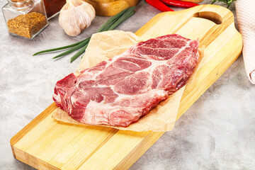 Raw pork neck steak for grill