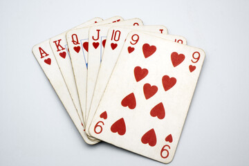 Cards, poker, red hearts, winning.
