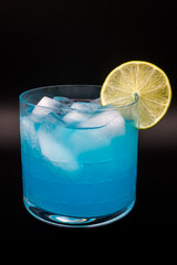 Blue drink in a decorative glass
