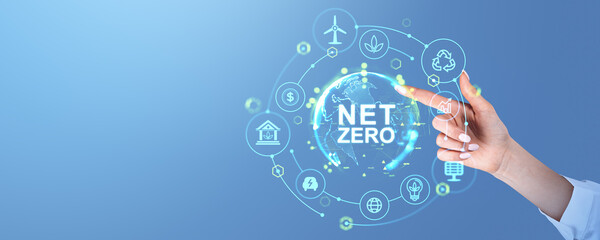 Woman finger touch net zero hologram and ecology icons connected. Copy space