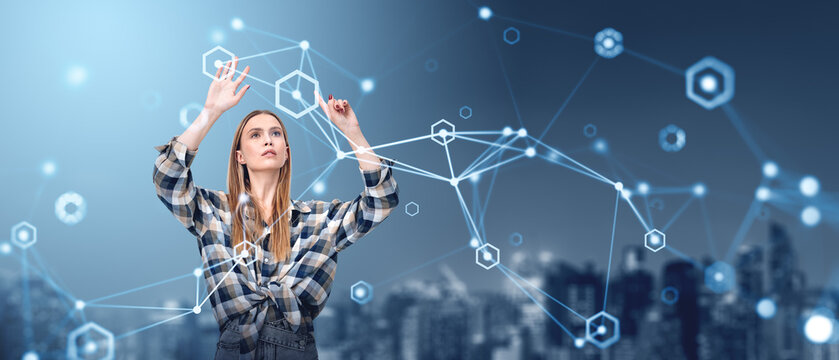 Woman in plaid shirt interacting with a virtual network of hexag - Powered by Adobe