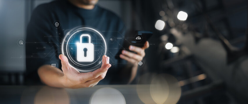 Cybersecurity data protection, businessman using laptop and smartphone internet network security, protect business financial transaction data from cyber attack, user private data security encryption.