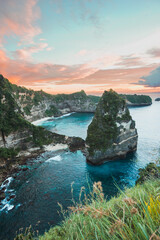 Early morning sunrise with Vew of cliff Nusa Penida Island, Bali, Indonesia. Azure beach, rocky mountains in ocean. summer background and summer vacation concept © Balnyes Visuals