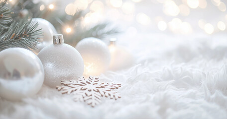 White cozy christmas background with christmas balls and christmas tree branches with warm lights, beige white colors and christmas atmosphere, glamour christmas background