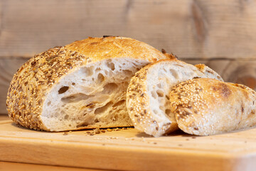 Homemade bread, sourdough wheat loaf with seeds