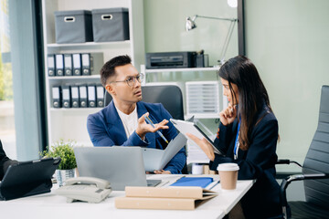 Business team discuss at meeting room. working together with laptop ,tablet and smart phone on desk Financial accountant