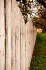 Fototapeta premium White color wood or wooden fence in farm with nobody in selective focus outdoor