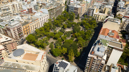 Aerial view of Garibaldi Gardens in Bari, Puglia, Italy. It is a large green area with a park and trees in the city.