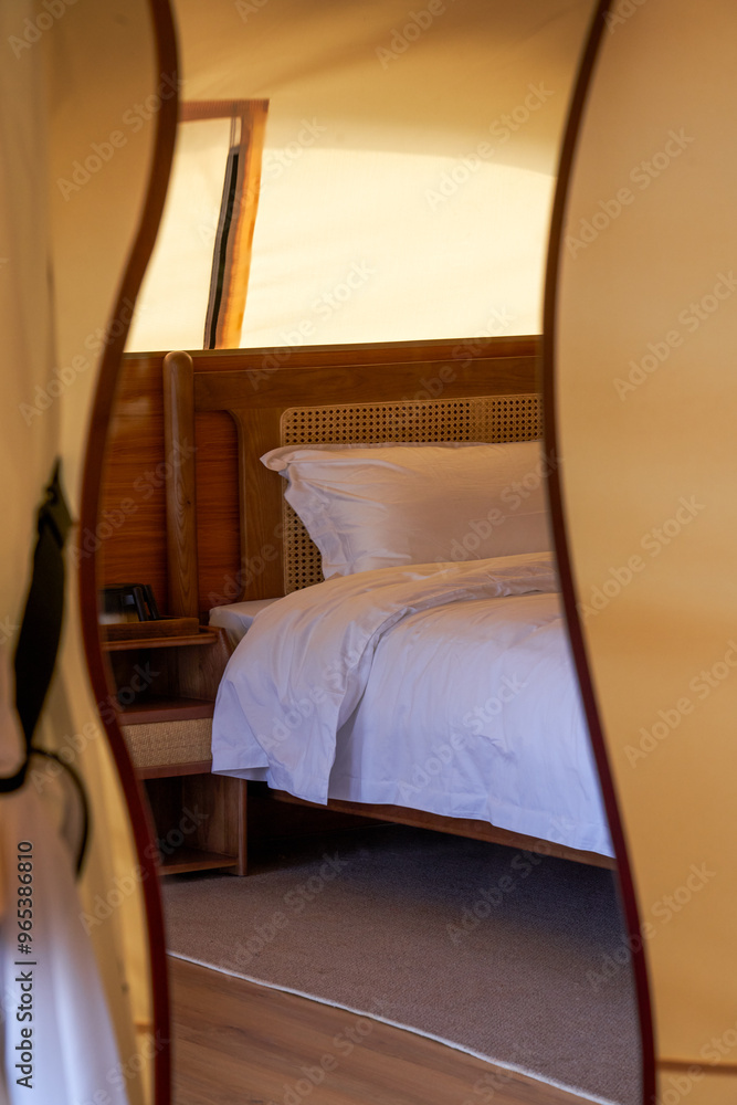 Wall mural Close up of bed in wooden house at outdoor holiday home