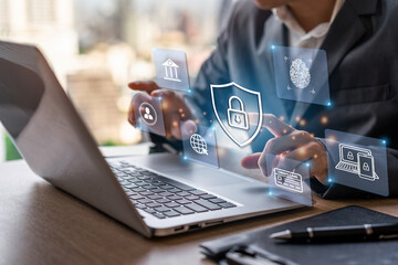 Businessman using smart devices with global network connection and cyber security business data protection technology