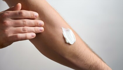 Applying cream to legs