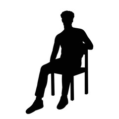 silhouette of a guy sitting on a chair on a white background vector