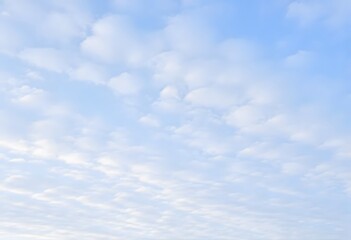 Fototapeta premium Fluffy Clouds Against a Blue Sky