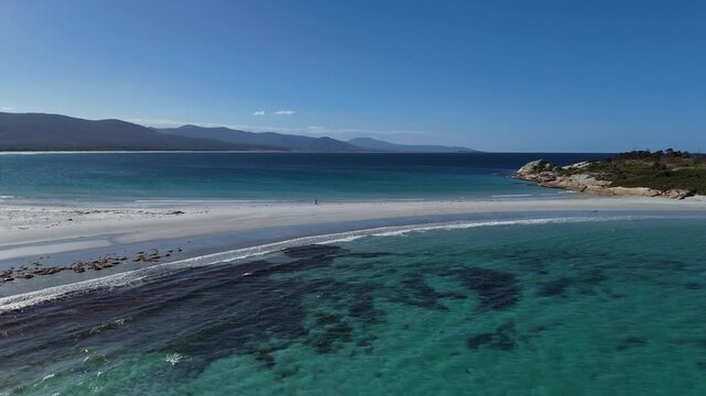 Aerial view of Diamond Island Bicheno and the azure waters in Tasmania, Australia.