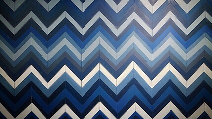 A patterned wall featuring various shades of blue in a zigzag design.