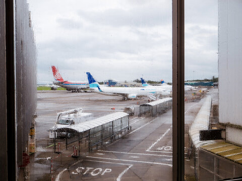 Shannon Airport, Ireland - 08.102023: View on a airplanes from a passengers terminal. Transportation industry and travel.