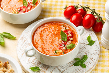 Spanish tomato soup Andalusian gazpacho, is a cold soup made of raw, blended vegetables as...
