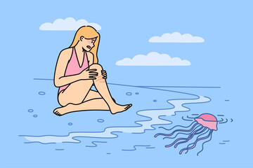 Jellyfish left burn on woman body after coming into contact with underwater in tropical ocean. Wound from jellyfish causes irritation and redness on skin of girl in need of medicinal ointment © Dzianis Vasilyeu