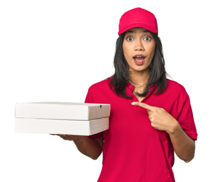 Latina delivering pizza, studio setup pointing to the side