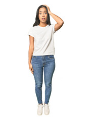 Obraz premium Full body shot of Latina in studio being shocked, she has remembered important meeting.