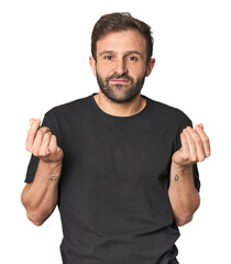 Studio portrait of young Hispanic male showing that she has no money.