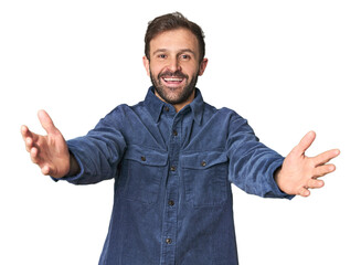 Studio portrait of young Hispanic male feels confident giving a hug to the camera.