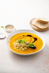 Homemade pumpkin soup with quinoa