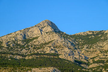 View of the Biokovo mountain range of the Dinaric Alps from Makarska riviera, Adriatic coast of Croatia