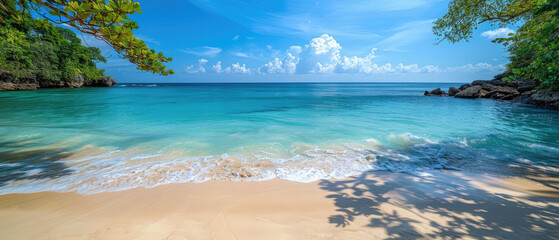 Obraz premium Amazing wide tropical paradise seaside beach in the morning with lots of white sand, blue water, clear sunny cloud weather and blue sky