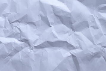 White crumpled paper texture background showing wrinkles and creases
