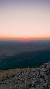 Rtanj mountain. Aerial view of the first rays of the rising sun above highest mountain peak Siljak.